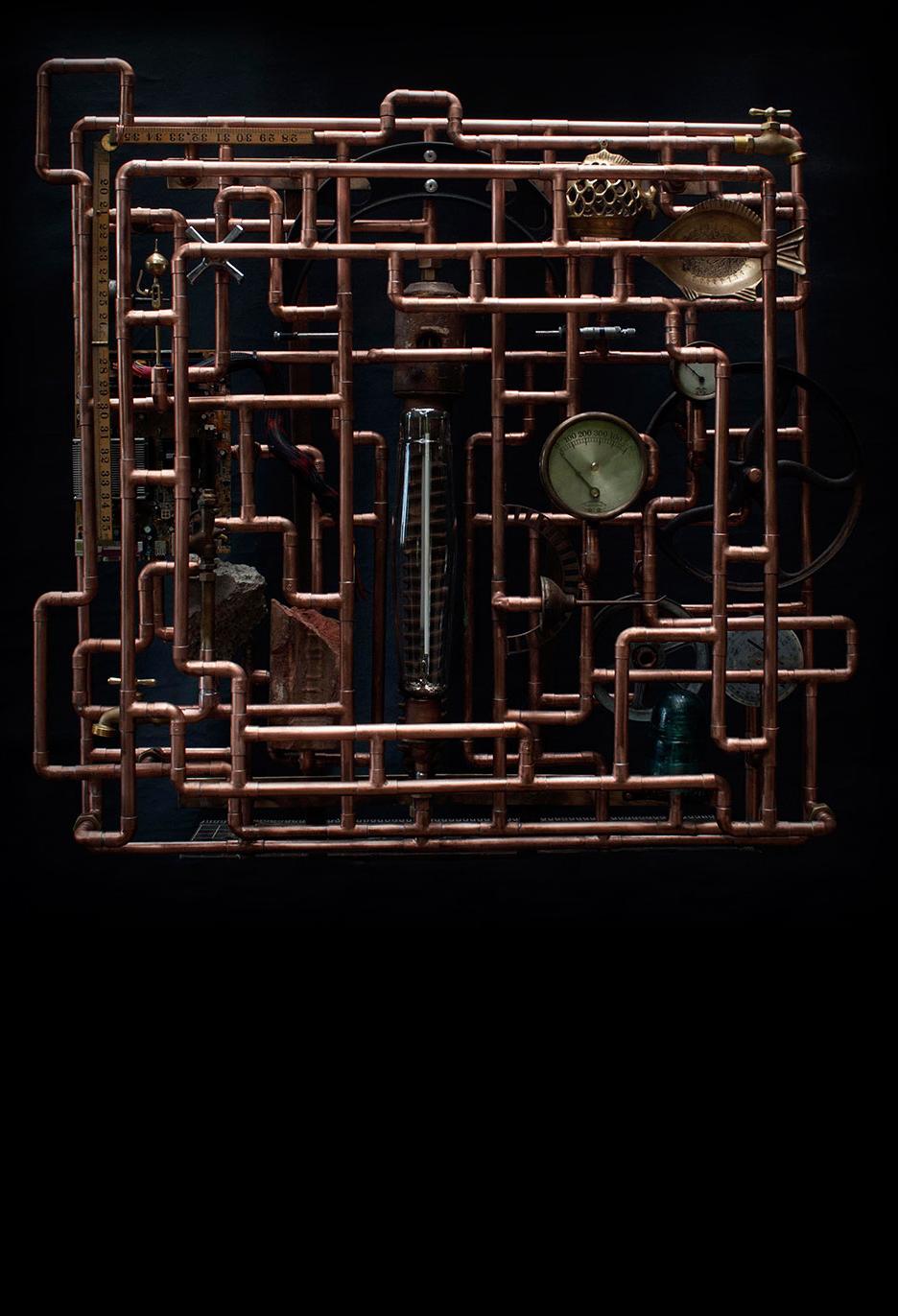 Pipe maze sculpture, Vancouver, BC  This copper tube pipe maze sculpture was commissioned by ASTTBC as a gift to mark BCIT’s 50th anniversary. It is located at the BCIT campus in Vancouver, BC. It is constructed of copper tube, and a selection of collected objects indicative of the various disciplines of engineering. 