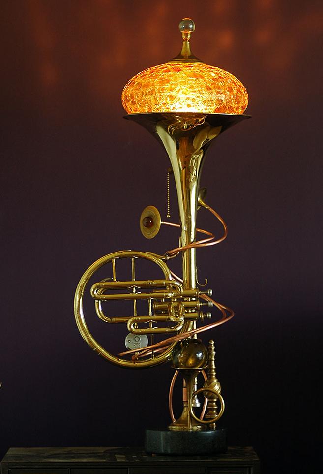 Lamp made from upcycled brass musical instrument, marble and glass.