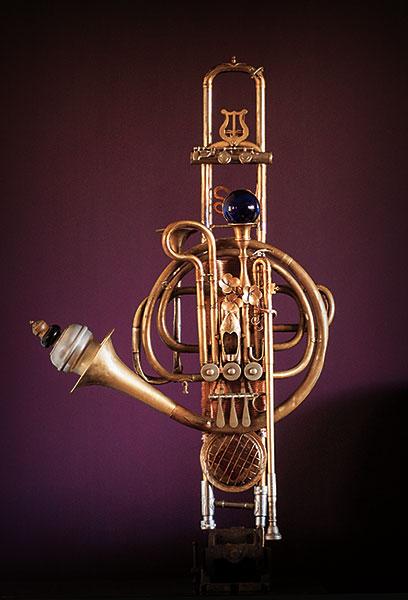 Wall sculpture made from a trombone slide. 